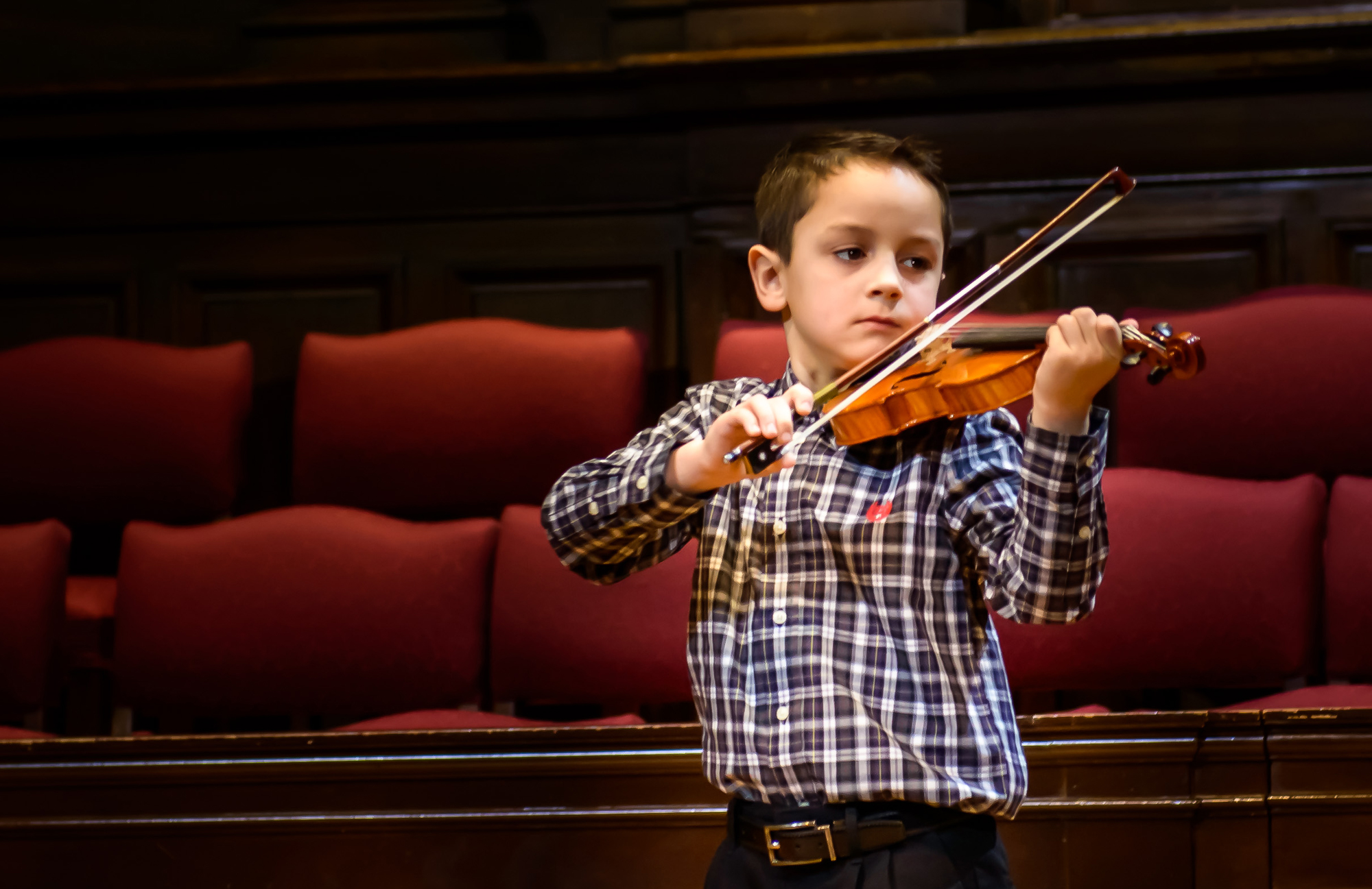 Image of young Academy of Strings student playing violin in individual Music Lesson